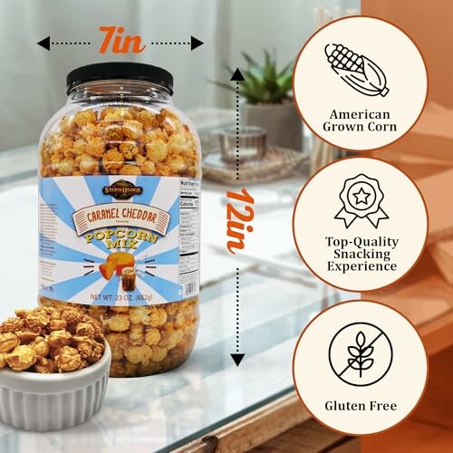 Jar of caramel cheddar popcorn mix on a table with product features highlighted.